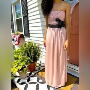 Long pink dress with black flowers details